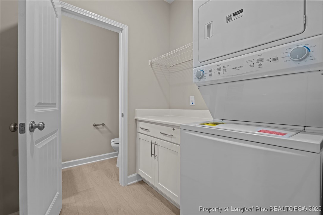 274 Rough Ridge Trail Aberdeen, NC 28315 - Photo 8 of 47 a utility room with dryer and washer