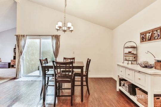 1023 North Norma Street Ridgecrest, CA 93555 - Photo 12 of 32 a view of a dining room with furniture window and wooden floor