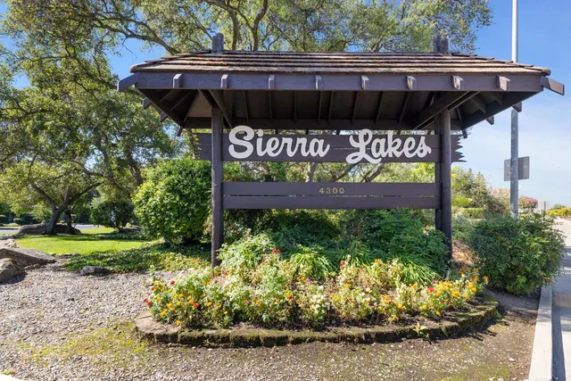 a black and white wall with a black white house