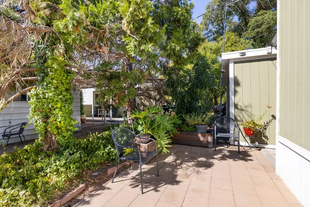 a backyard of a house with lots of green space