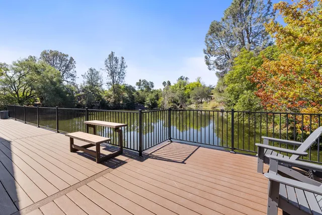 a view of staircase with furniture and window