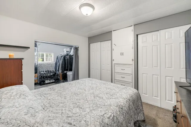 a front view of a house with flowers