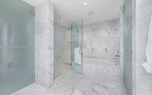 a bathroom with a shower and a toilet