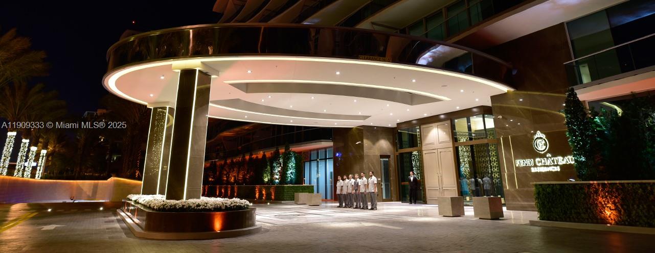 9349 Collins Avenue, Unit 304 Surfside, FL 33154 - Photo 35 of 40 a view of a patio with table and chairs