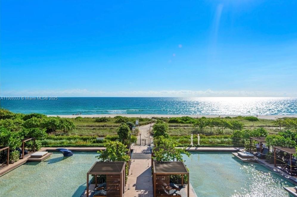 9349 Collins Avenue, Unit 304 Surfside, FL 33154 - Photo 7 of 40 a view of an ocean and beach