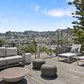 a view of a terrace with furniture