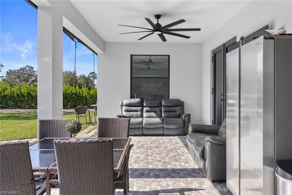 2406 37th Avenue Northeast Naples, FL 34120 - Photo 21 of 29 View of sunroom