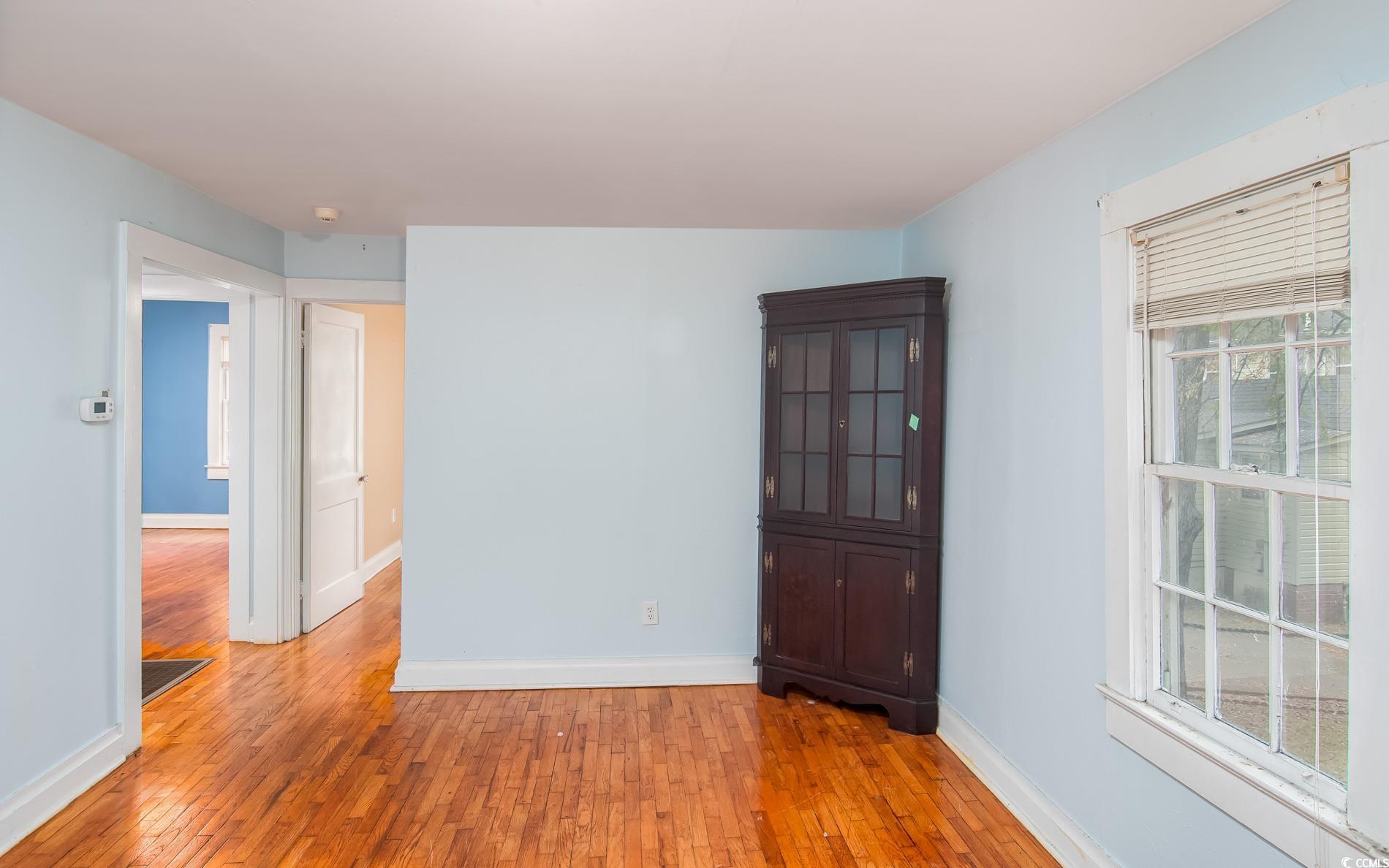 1010 Highmarket Street Georgetown, SC 29440 - Photo 28 of 32 Spare room featuring light wood-style flooring and baseboards