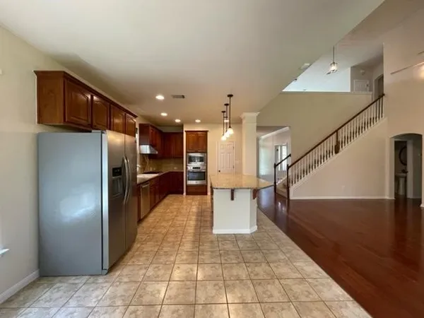 a view of entryway with stairs and a window