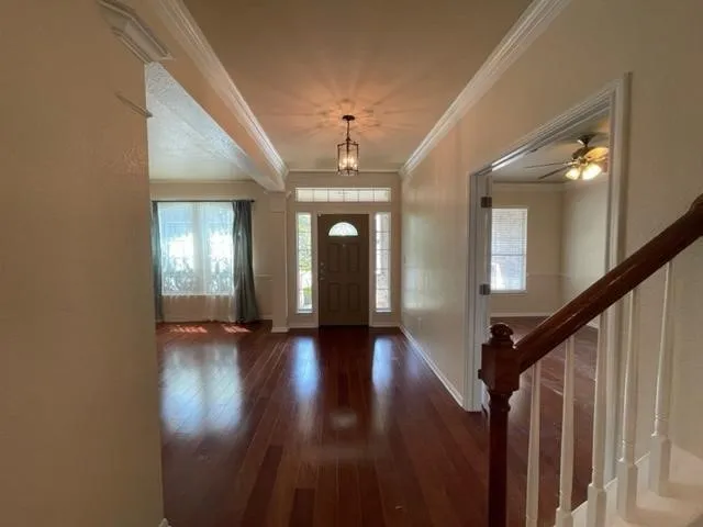 a view of gallery with wooden floor