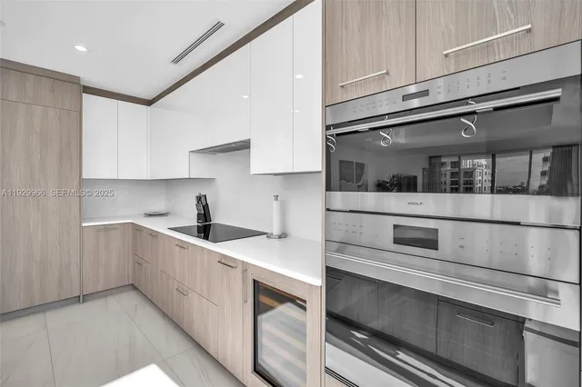 a bed room with a bed and a window