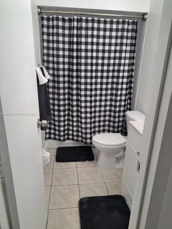 a bathroom with a toilet