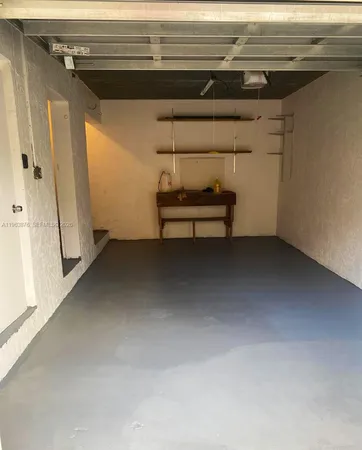 a view of room with racks on the wall