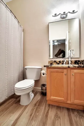 a bedroom with two beds and a large window