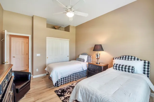 a bathroom with a toilet a sink and a mirror