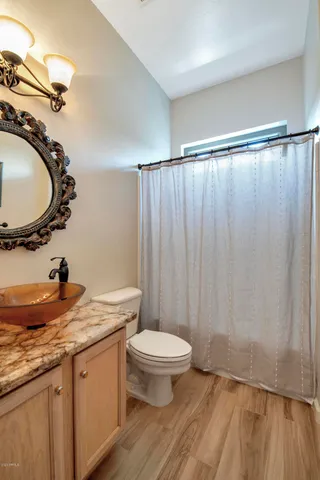 a view of swimming pool with outdoor seating and a yard