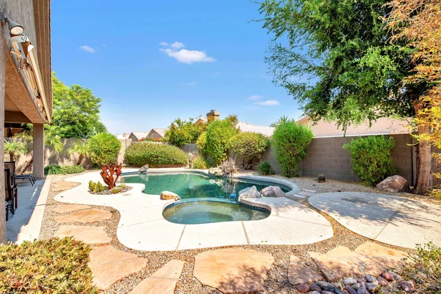 a view of a swimming pool in the outdoor space