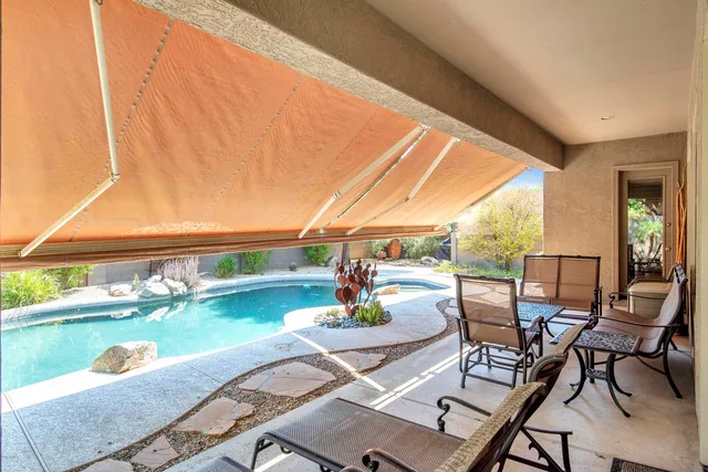 a view of a pathway both side of house