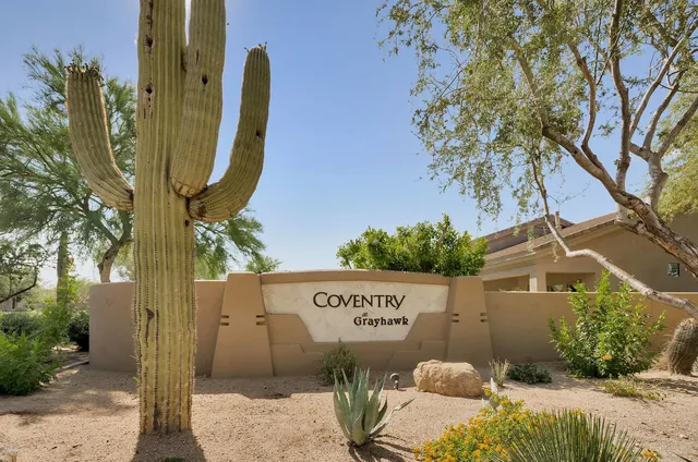 a view of yard with swimming pool and green space