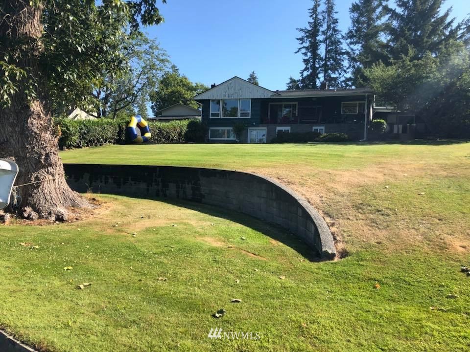 a view of swimming pool with a garden