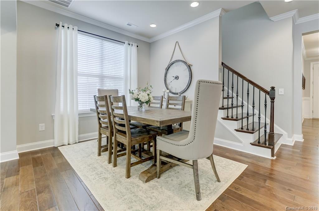 108 Helton Lane Fort Mill, SC 29708 - Photo 20 of 48 a view of a dining room with furniture and wooden floor