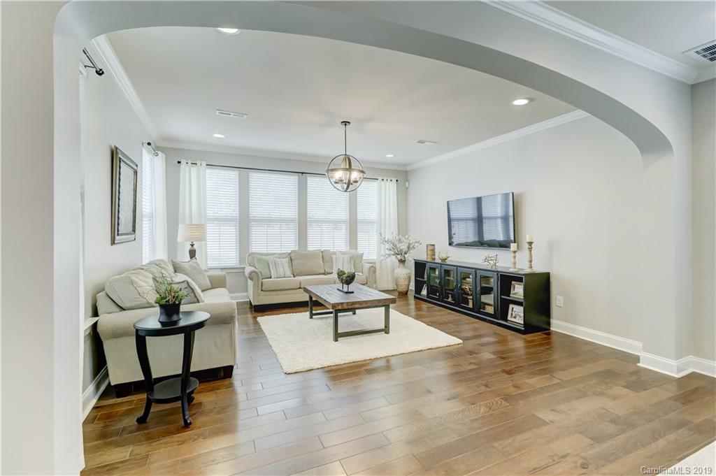108 Helton Lane Fort Mill, SC 29708 - Photo 22 of 48 a living room with furniture and wooden floor