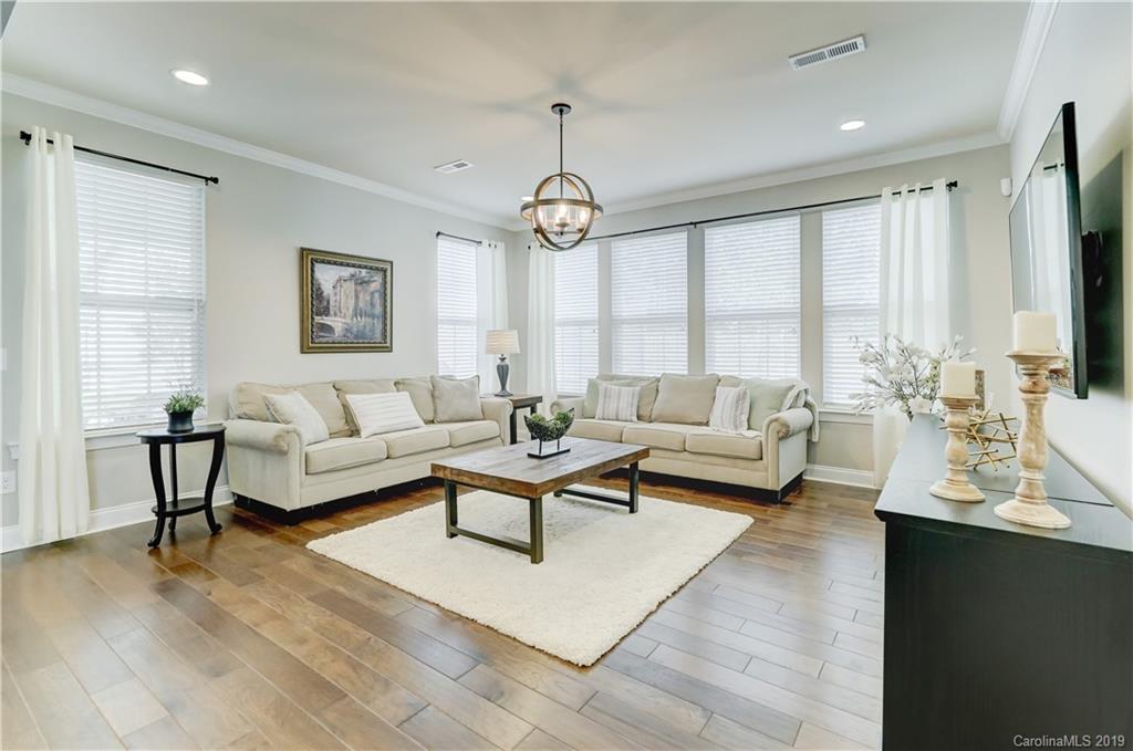 108 Helton Lane Fort Mill, SC 29708 - Photo 23 of 48 a living room with furniture fireplace and a large window