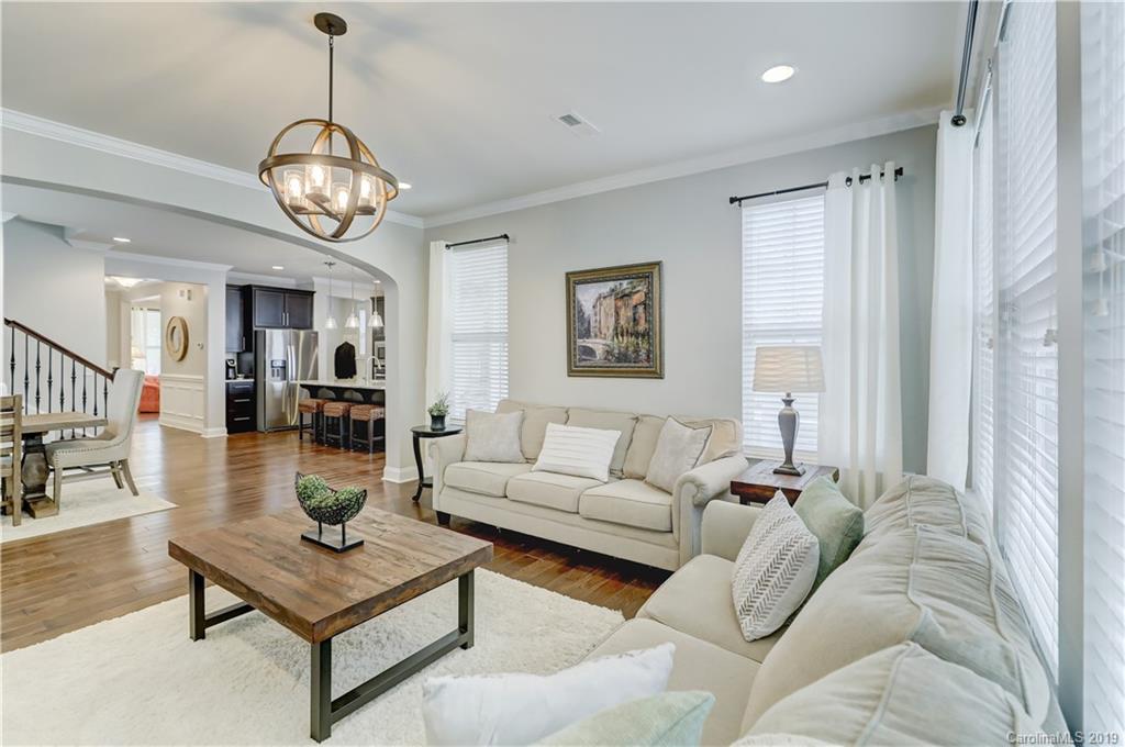 108 Helton Lane Fort Mill, SC 29708 - Photo 25 of 48 a living room with furniture a dining table and a window