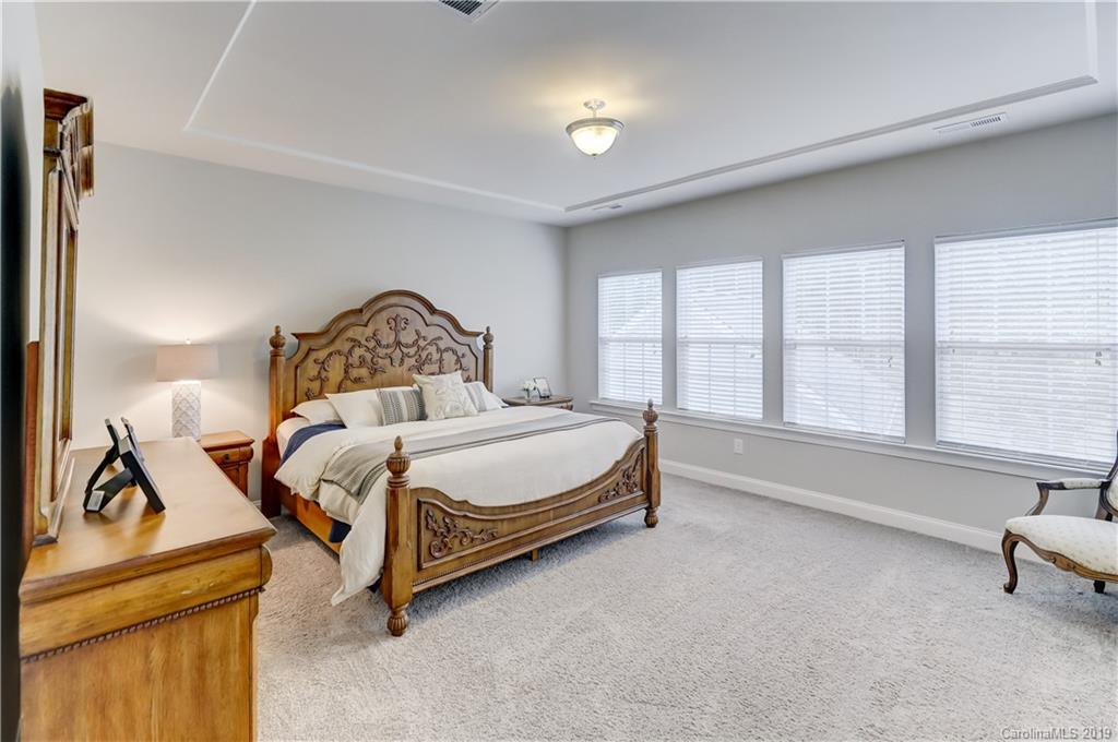 108 Helton Lane Fort Mill, SC 29708 - Photo 35 of 48 a bedroom with a bed and a large window