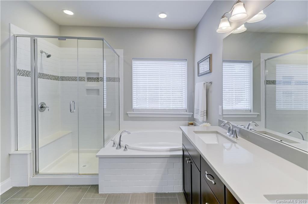 108 Helton Lane Fort Mill, SC 29708 - Photo 38 of 48 a bathroom with a double vanity sink mirror and shower