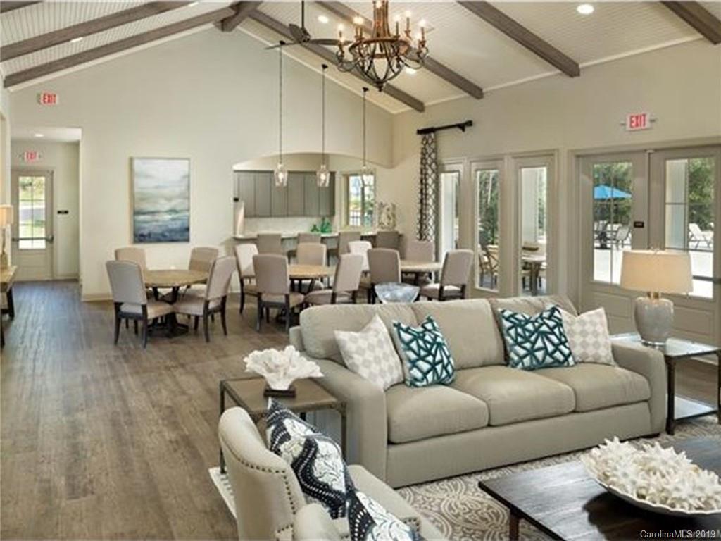 108 Helton Lane Fort Mill, SC 29708 - Photo 48 of 48 a living room with furniture and a chandelier