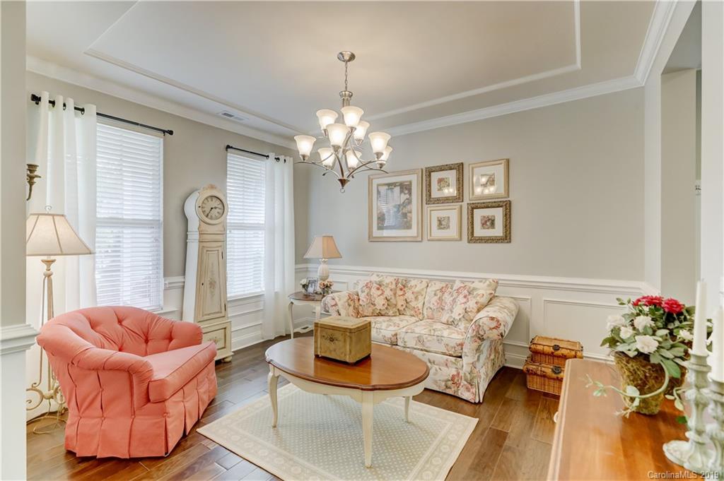 108 Helton Lane Fort Mill, SC 29708 - Photo 9 of 48 a living room with furniture and a chandelier