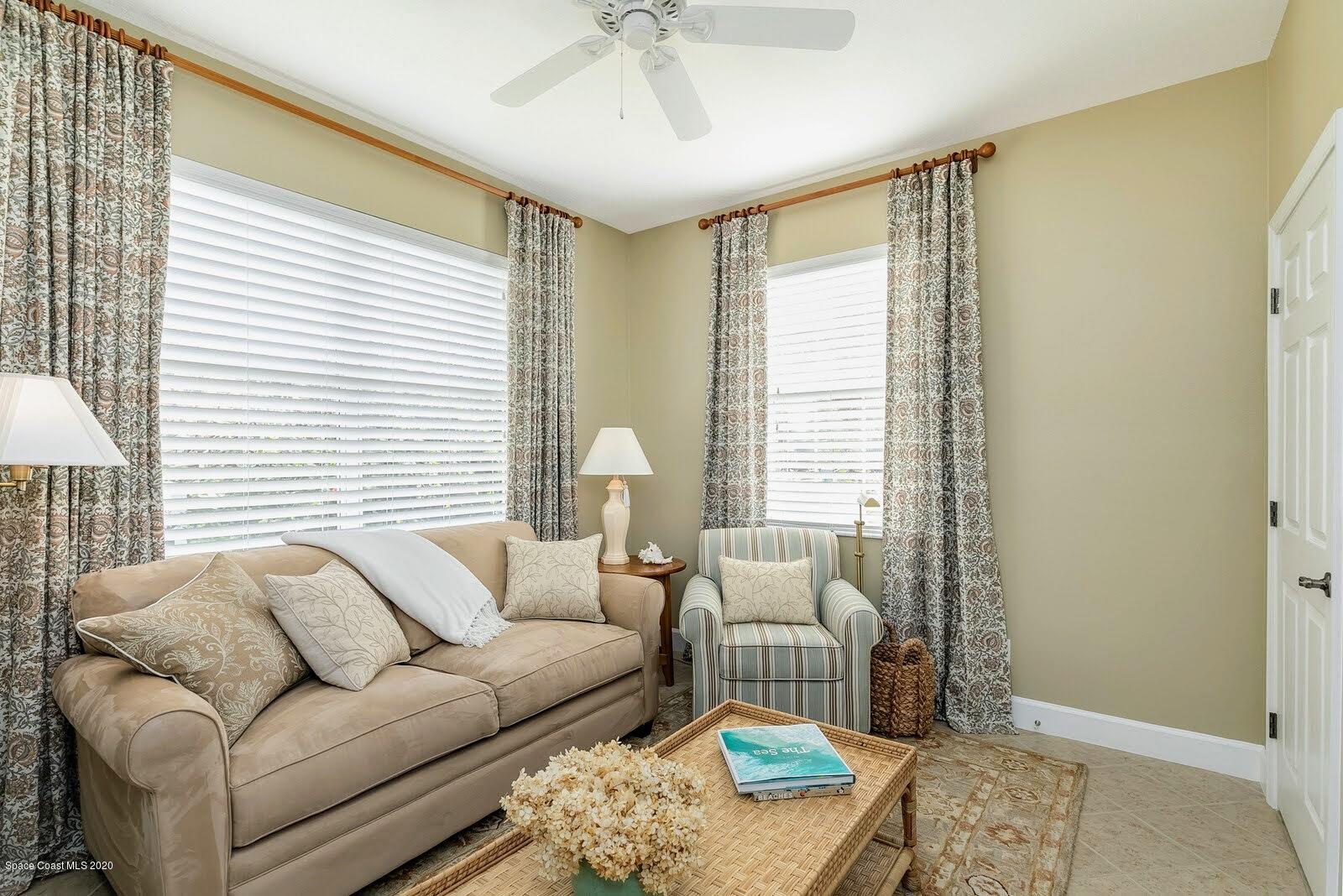 230 Richards Road Melbourne Beach, FL 32951 - Photo 13 of 42 a living room with furniture and a window