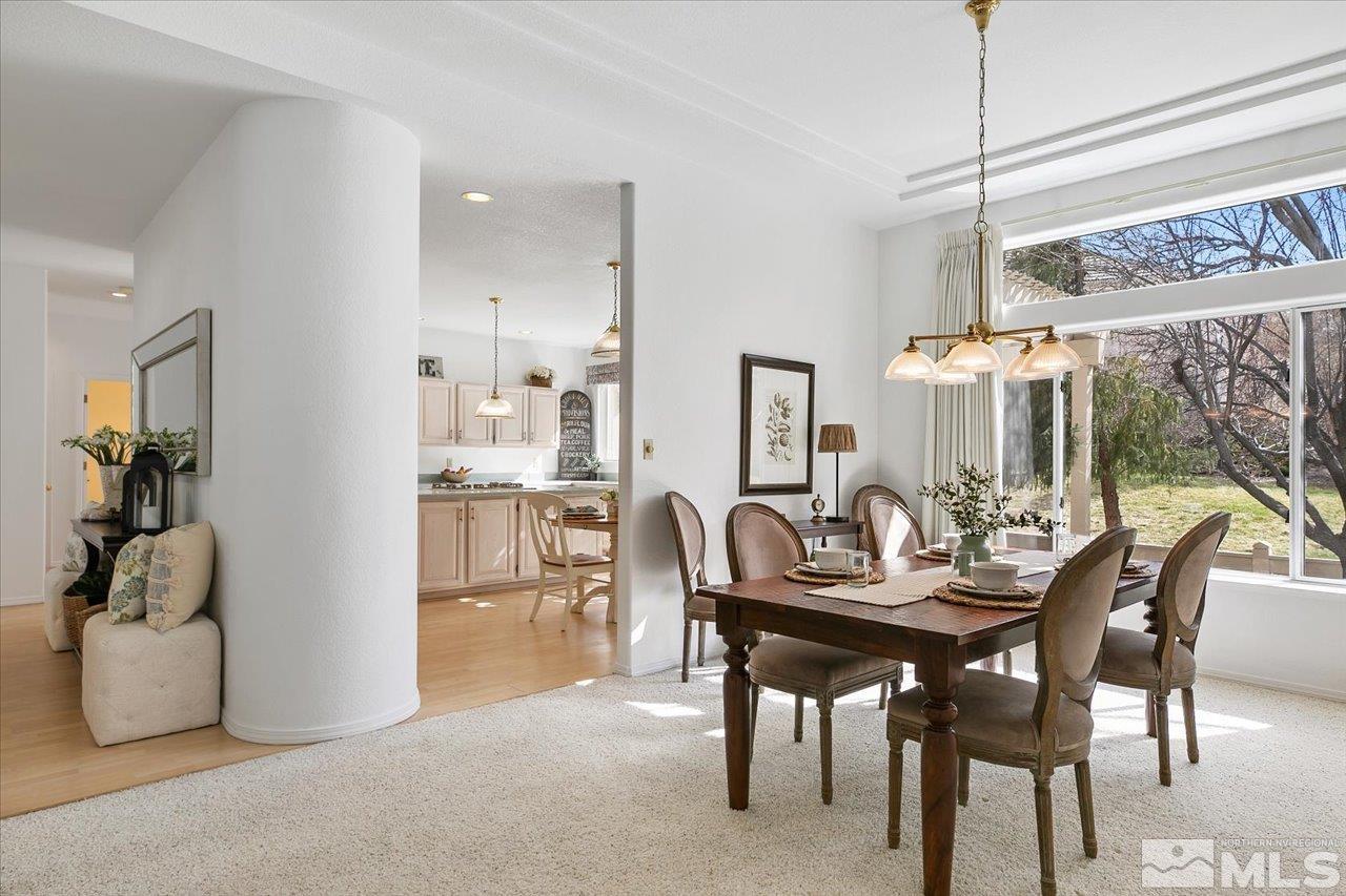 4035 Caughlin Creek Road Reno, NV 89519 - Photo 11 of 40 a dining room with furniture and window