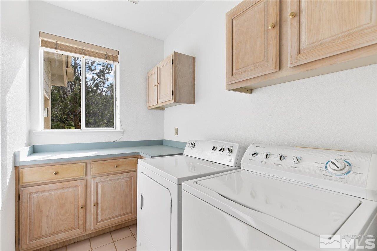 4035 Caughlin Creek Road Reno, NV 89519 - Photo 29 of 40 a utility room with dryer and washer