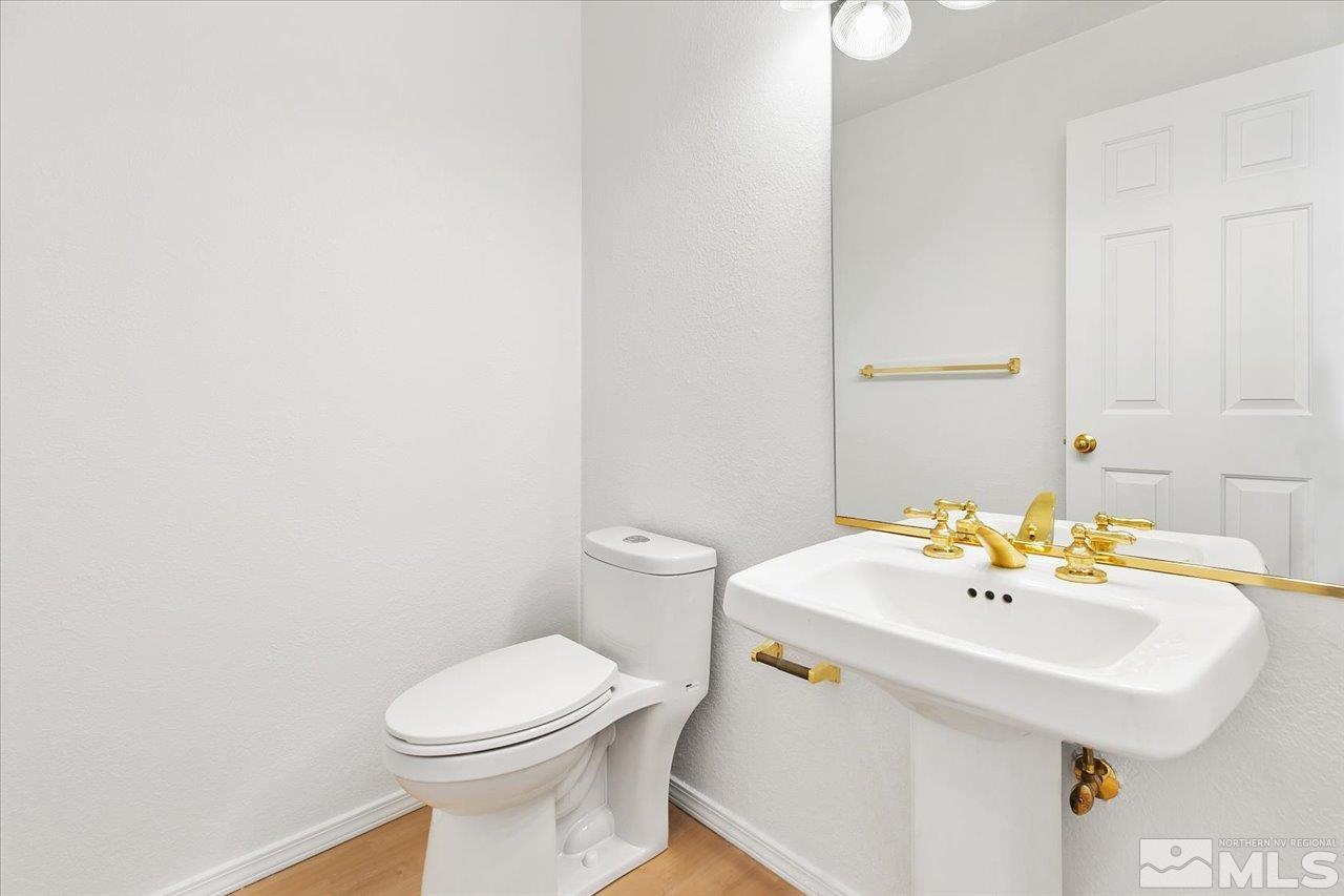 4035 Caughlin Creek Road Reno, NV 89519 - Photo 30 of 40 a bathroom with a sink and a toilet