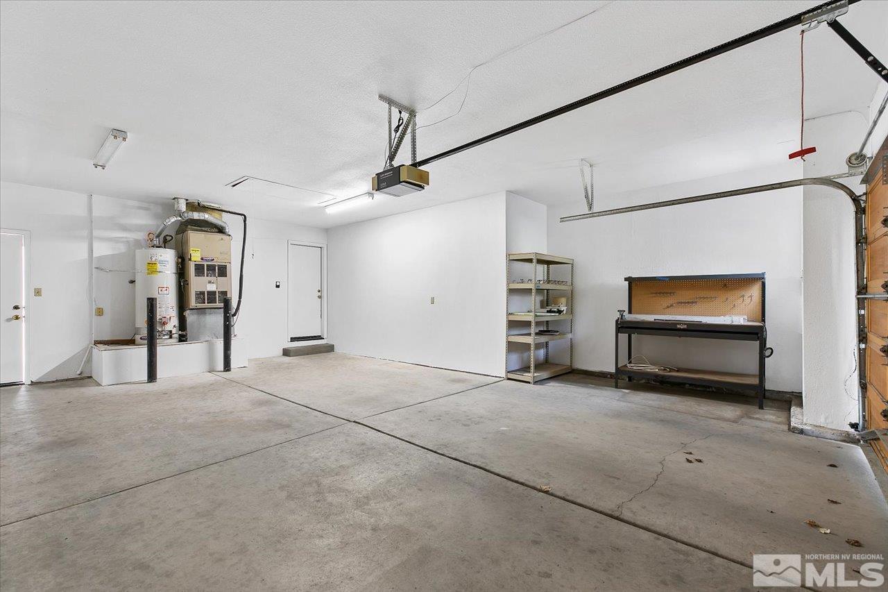 4035 Caughlin Creek Road Reno, NV 89519 - Photo 31 of 40 a view of an empty room with a fireplace