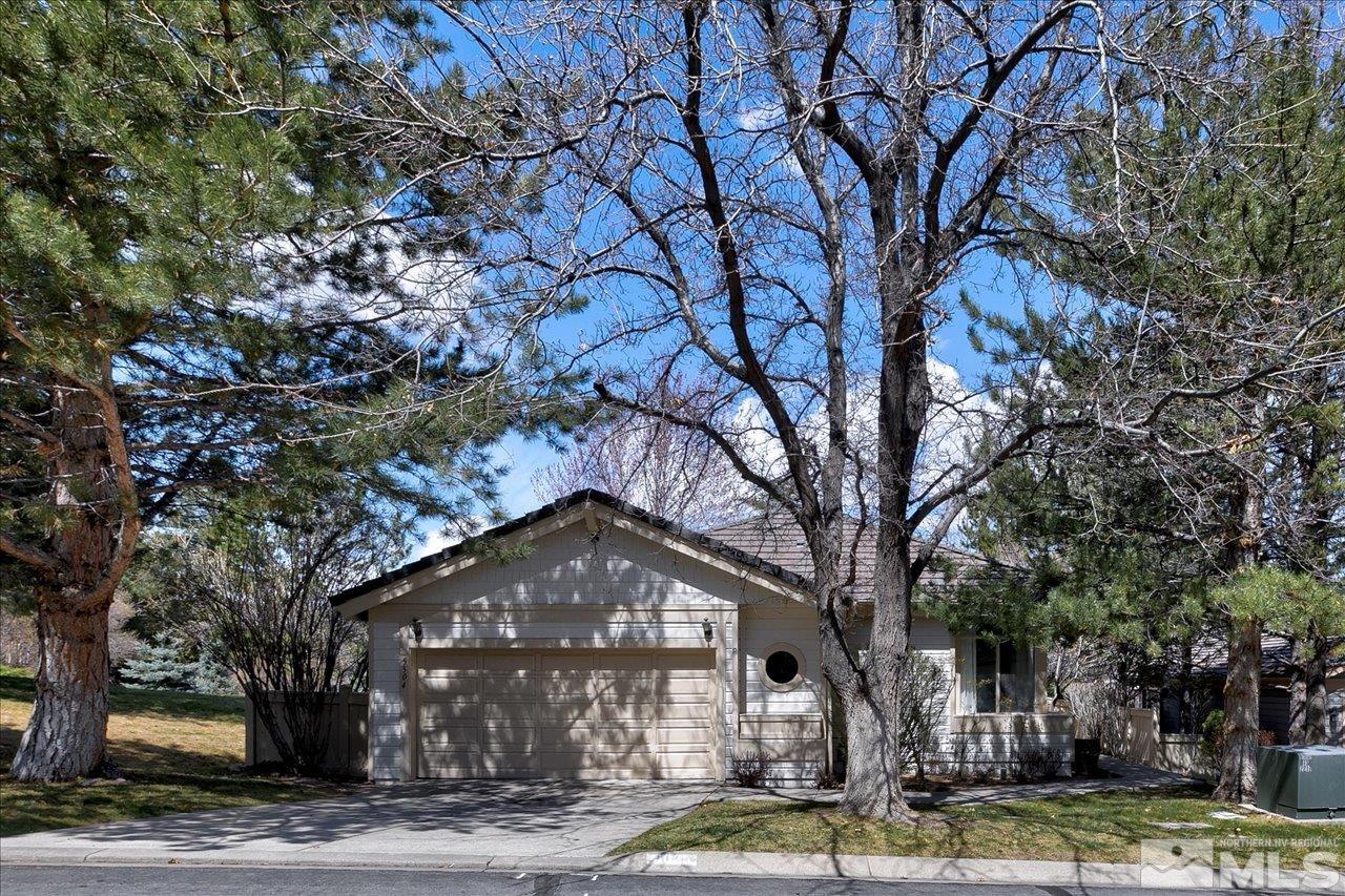 4035 Caughlin Creek Road Reno, NV 89519 - Photo 40 of 40 a front view of a house with a yard