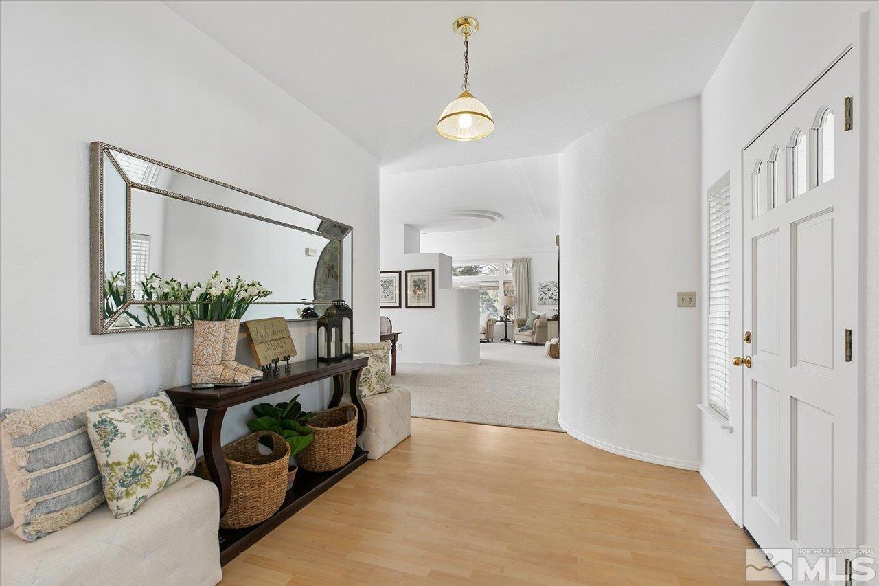 4035 Caughlin Creek Road Reno, NV 89519 - Photo 5 of 40 a view of livingroom with furniture and cabinet