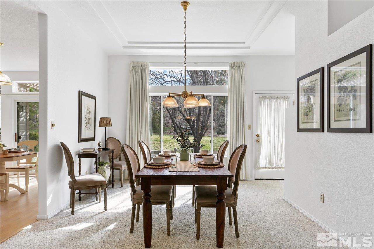 4035 Caughlin Creek Road Reno, NV 89519 - Photo 10 of 40 a view of a dining room with furniture window and outside view