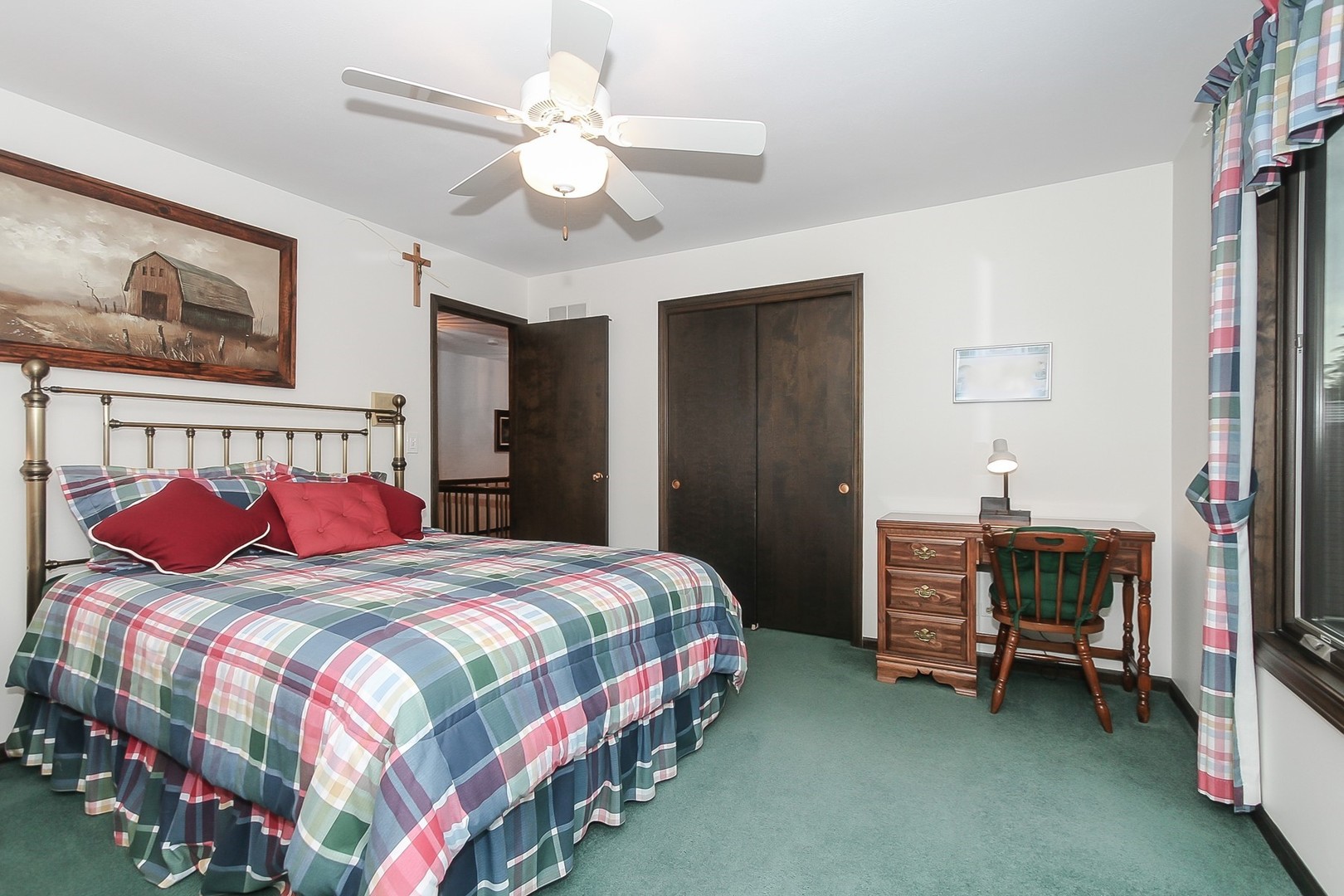 150 Shady Lane Bartlett, IL 60103 - Photo 22 of 34 a bedroom with bed and a chandelier