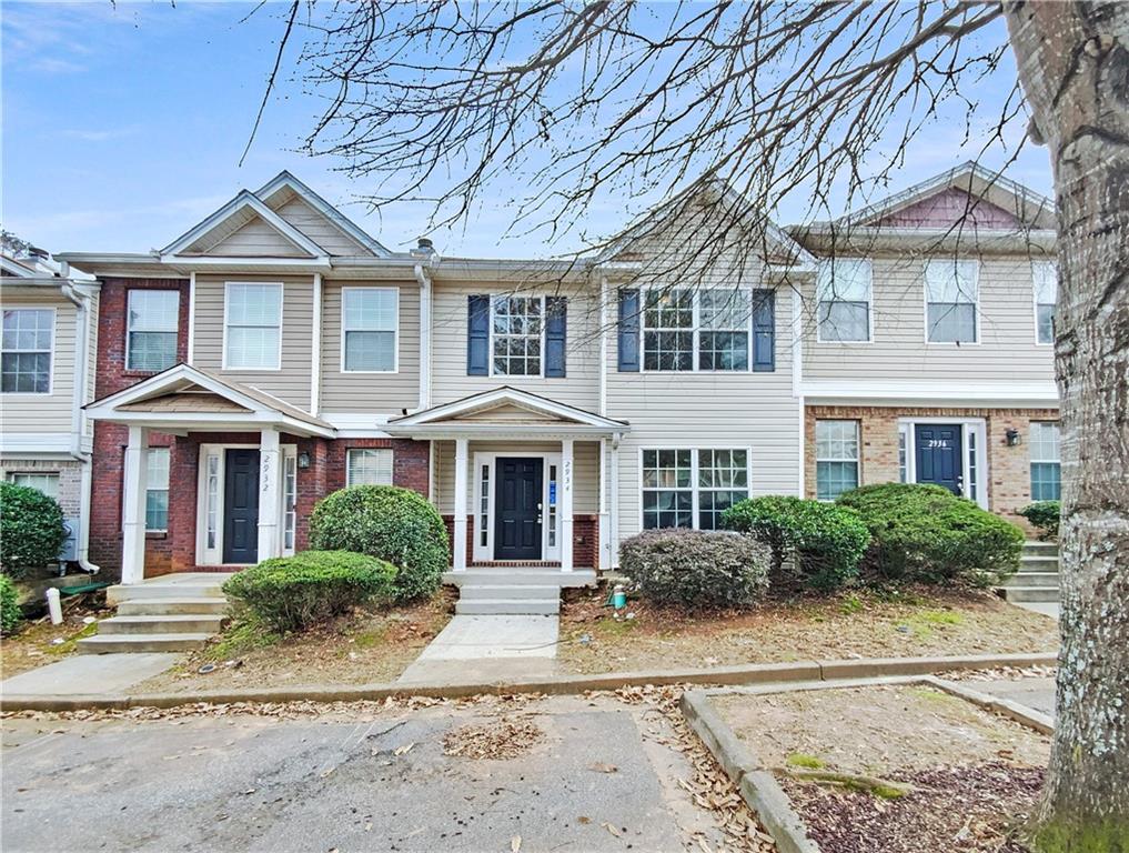 2934 Vining Ridge Terrace Decatur, GA 30034 - Photo 1 of 1 a front view of a house with a yard