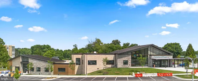 a view of balcony with a dining table and chairs