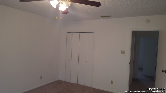 320 Station Street, Unit 101 Converse, TX 78109 - Photo 11 of 14 a view of a chandelier fan