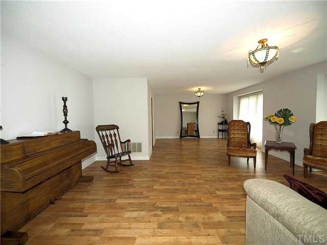 4405 Myrtle Court Raleigh, NC 27604 - Photo 4 of 16 Living and Dining Room. Low maintenance and lifetime laminate floor is about 5 years old.