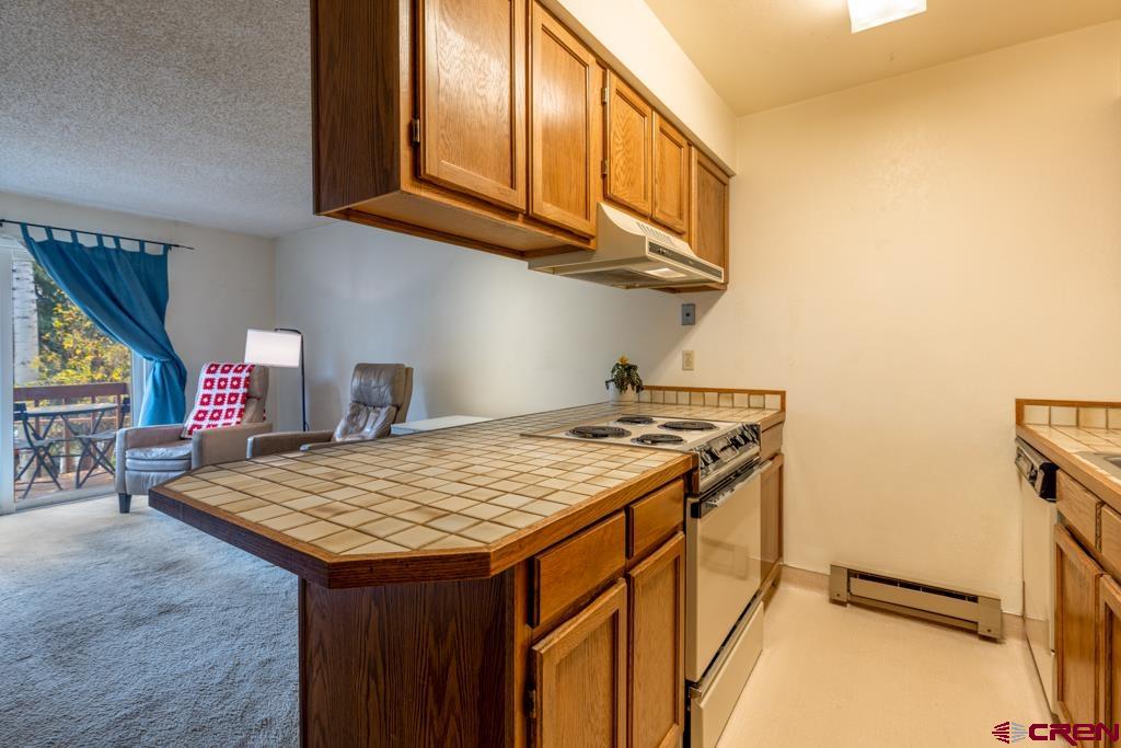 1851 Florida Road, Unit 106 Durango, CO 81301 - Photo 12 of 25 a utility room with dryer and washer
