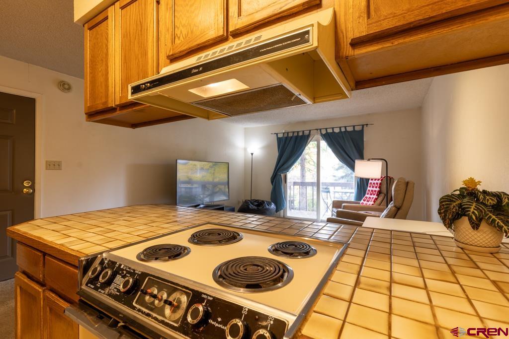 1851 Florida Road, Unit 106 Durango, CO 81301 - Photo 13 of 25 a bed sitting in a kitchen next to a window