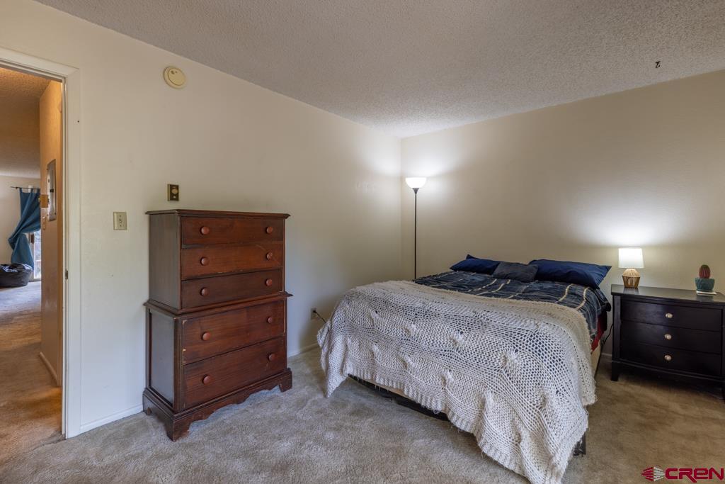 1851 Florida Road, Unit 106 Durango, CO 81301 - Photo 17 of 25 a bedroom with a bed and a closet