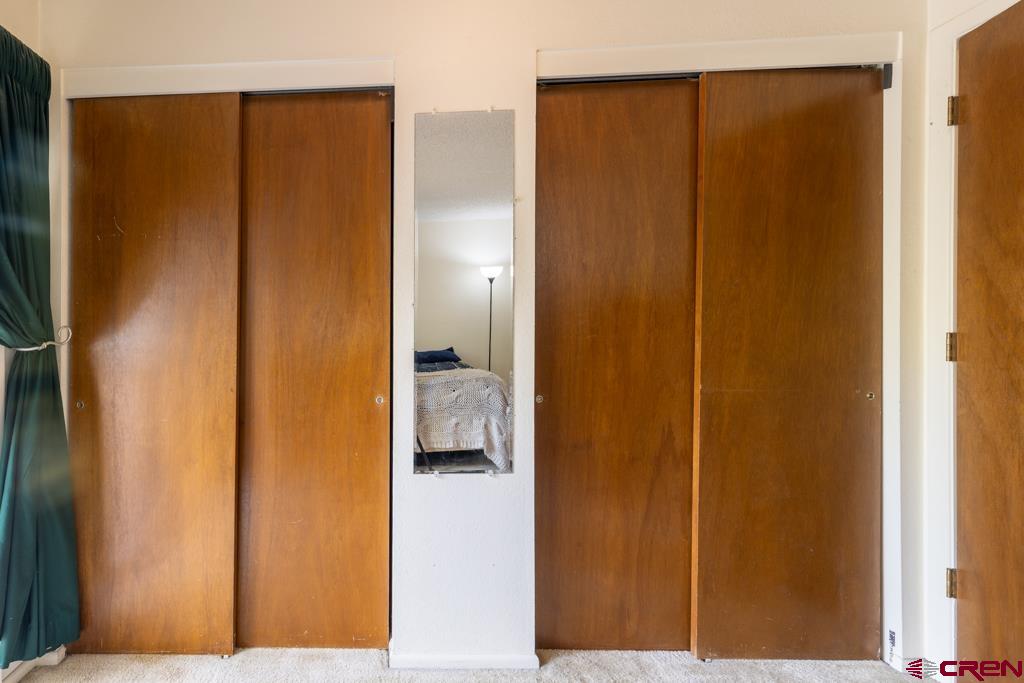1851 Florida Road, Unit 106 Durango, CO 81301 - Photo 21 of 25 a view of a bathroom with a glass door and shower