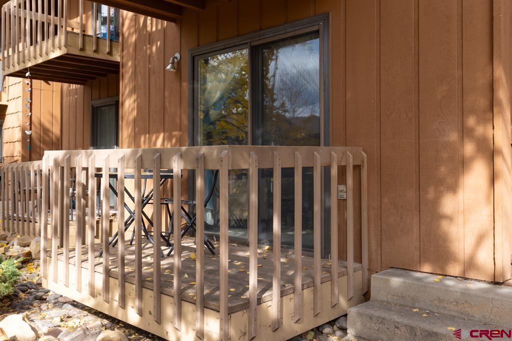 1851 Florida Road, Unit 106 Durango, CO 81301 - Photo 6 of 25 a view of a porch with a table